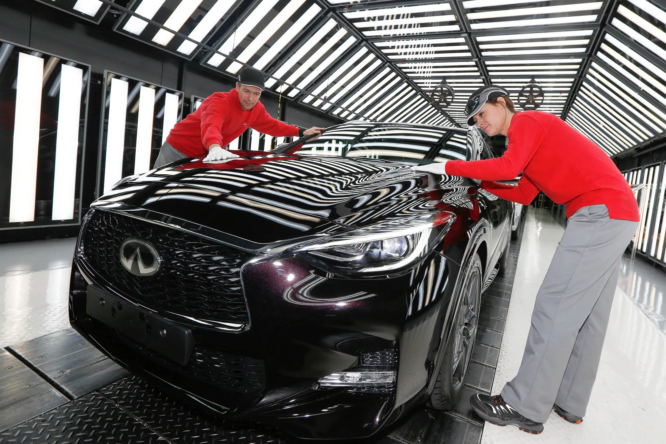Quality inspection on an Infiniti Q30 car at the Nissan plant in Sunderland.
