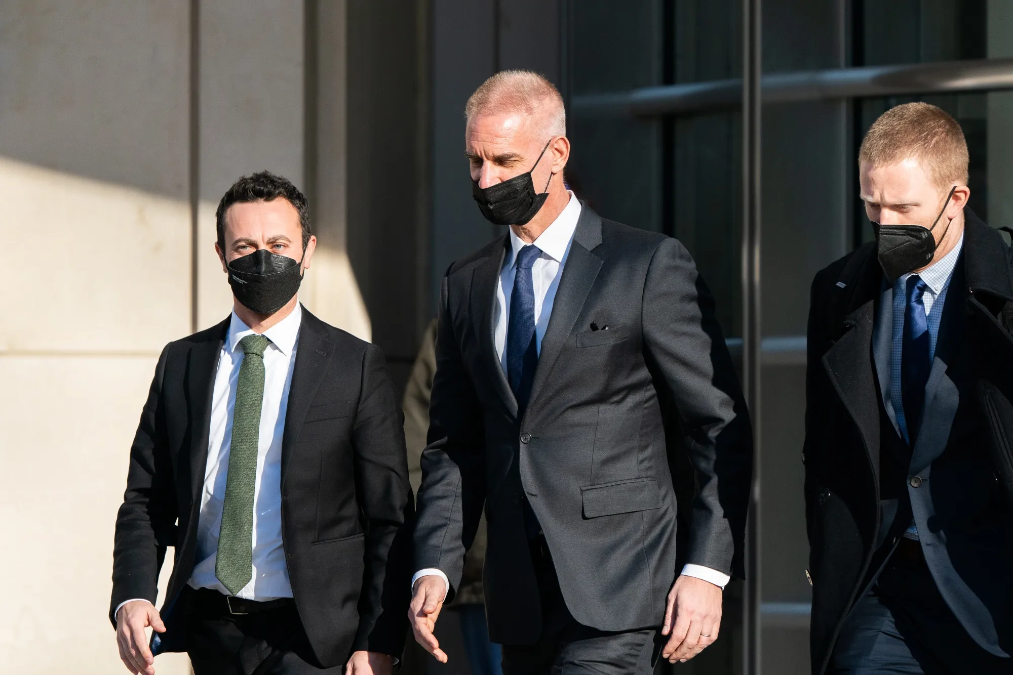 Tim Leissner, center, departs federal court in Brooklyn, New York, in 2022.