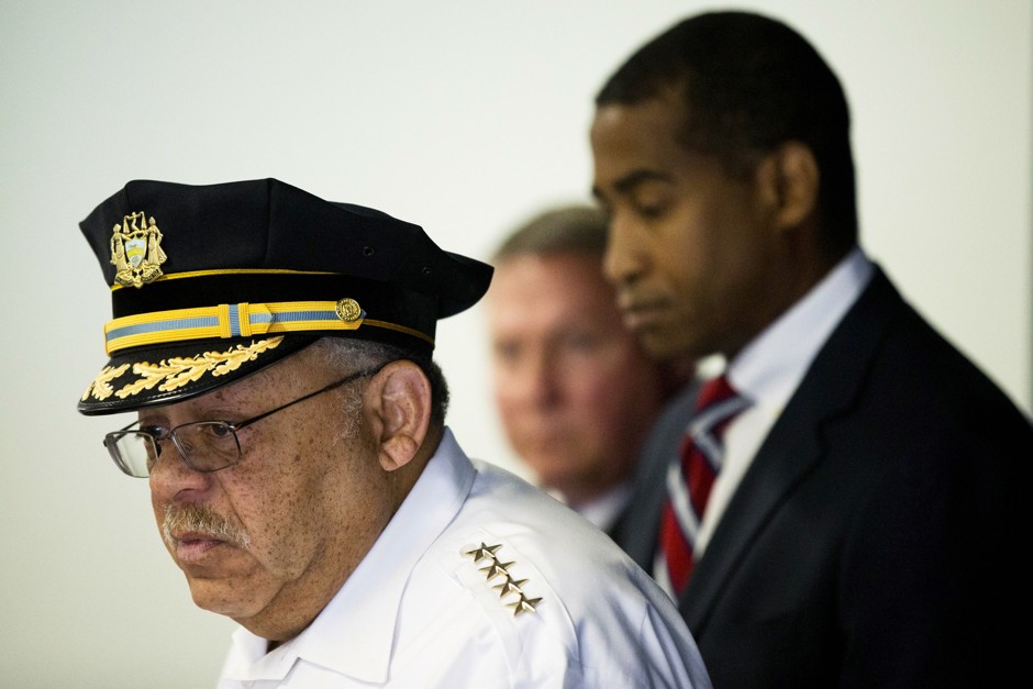 Philadelphia Police Commissioner Charles Ramsey, left, FBI Special Agent-in-Charge Edward Hanko, center, and United States Attorney Zane David Memeger, appear at a 2014 news conference announcing that six Philadelphia narcotics officers had been indicted on charges they spent years using gangland tactics against alleged drug dealers. All six officers were acquitted Thursday. 