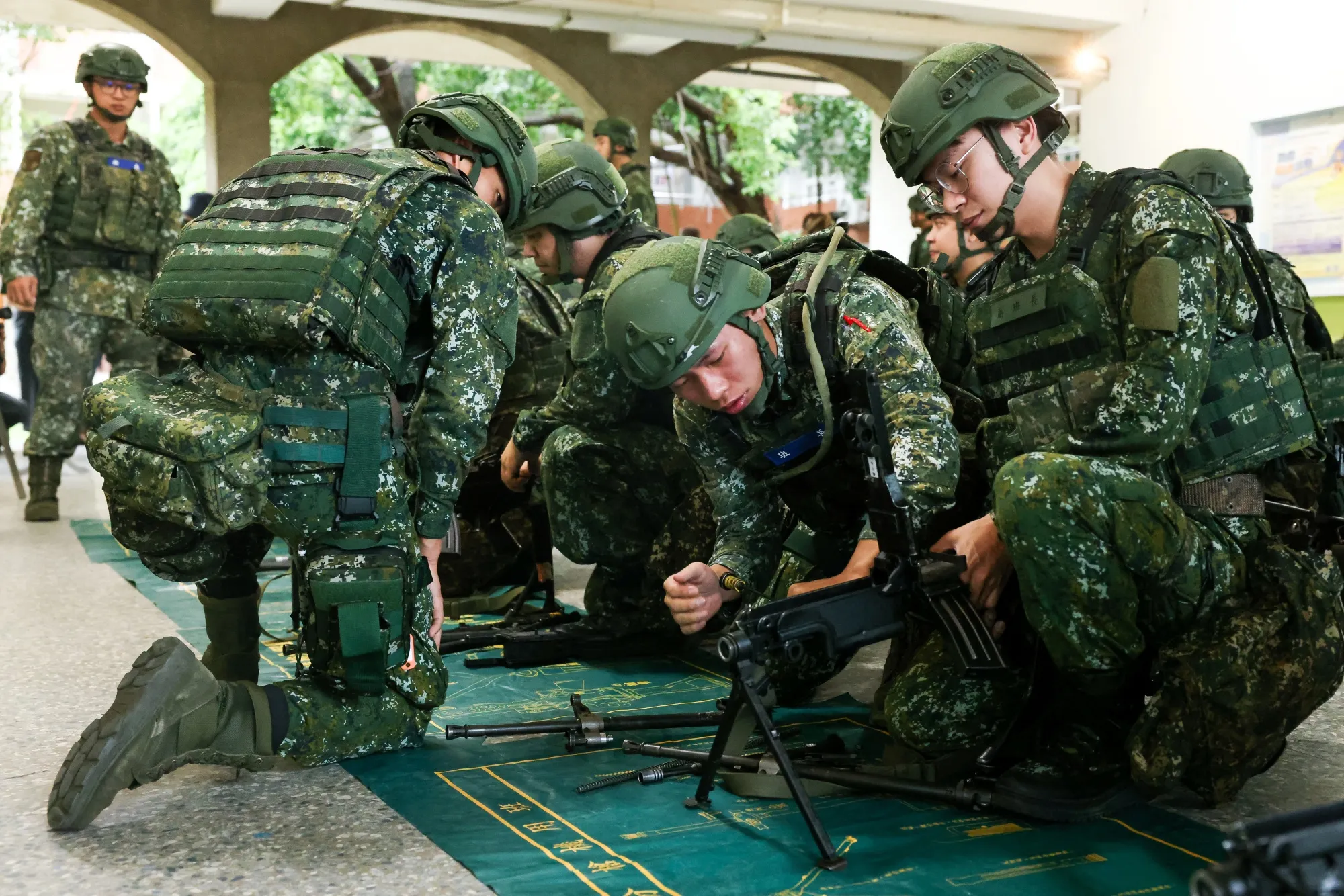 Taiwanese reservists participate in pre-combat training on the first day of the annual Han Kuang military exercise in Miaoli on July 9.