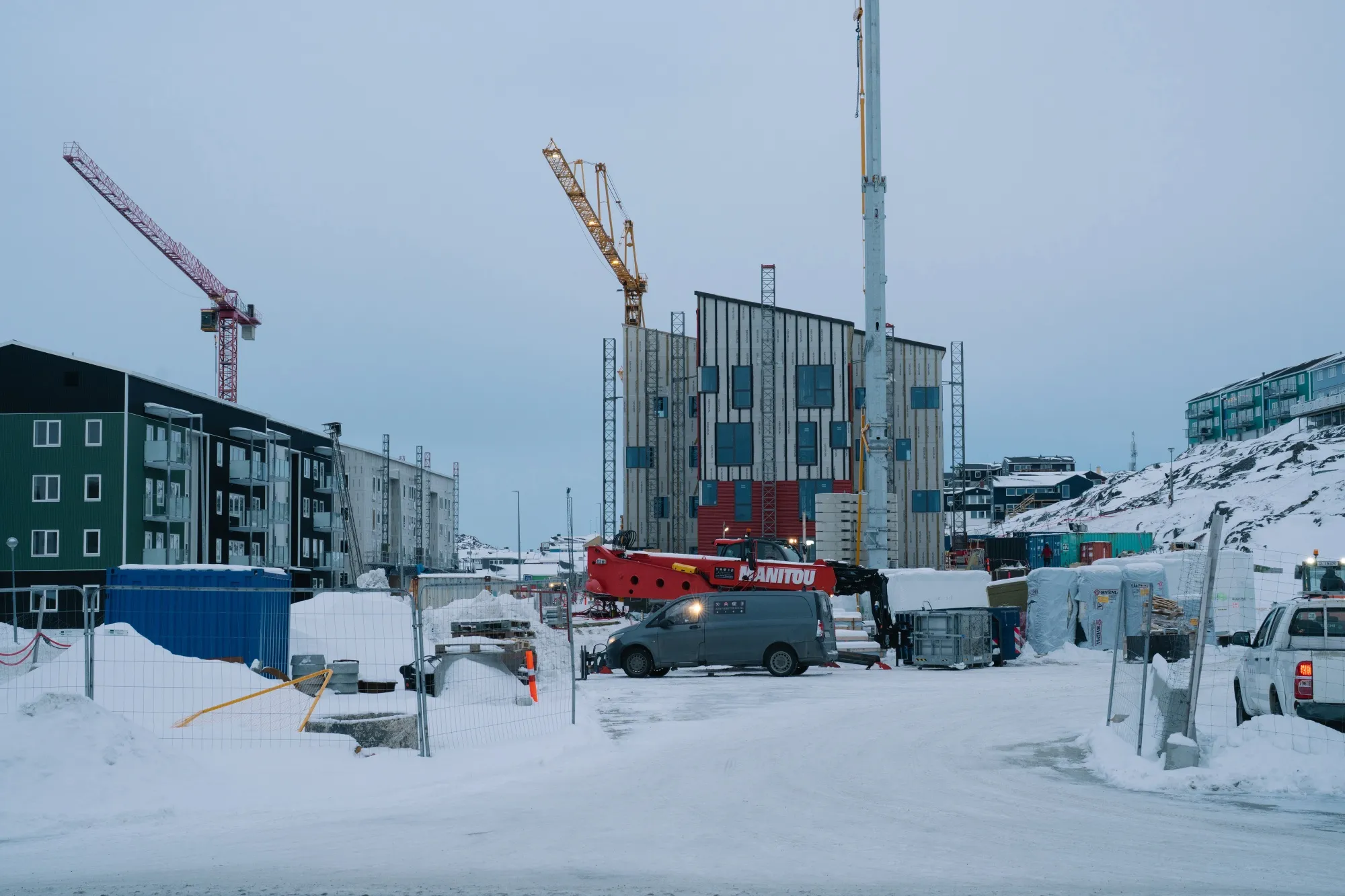 Construction cranes near buildings in Nuuk, Greenland, on Jan. 16, 2026.