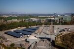 Photovoltaic panels installed by Sud Energies Renovables SL cover car parking areas at the Banco de Sabadell SA headquarters in Sant Cugat del Valles, Spain.