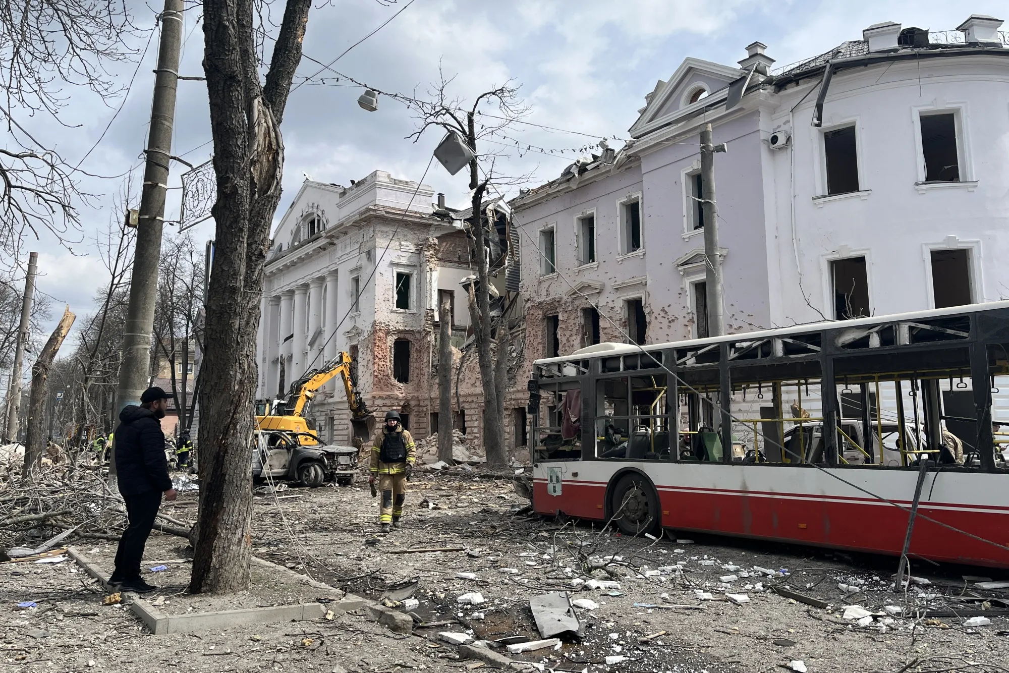 Ukrainian law enforcement officers at the site of a missile attack in Sumy, northeastern Ukraine, on April 13.