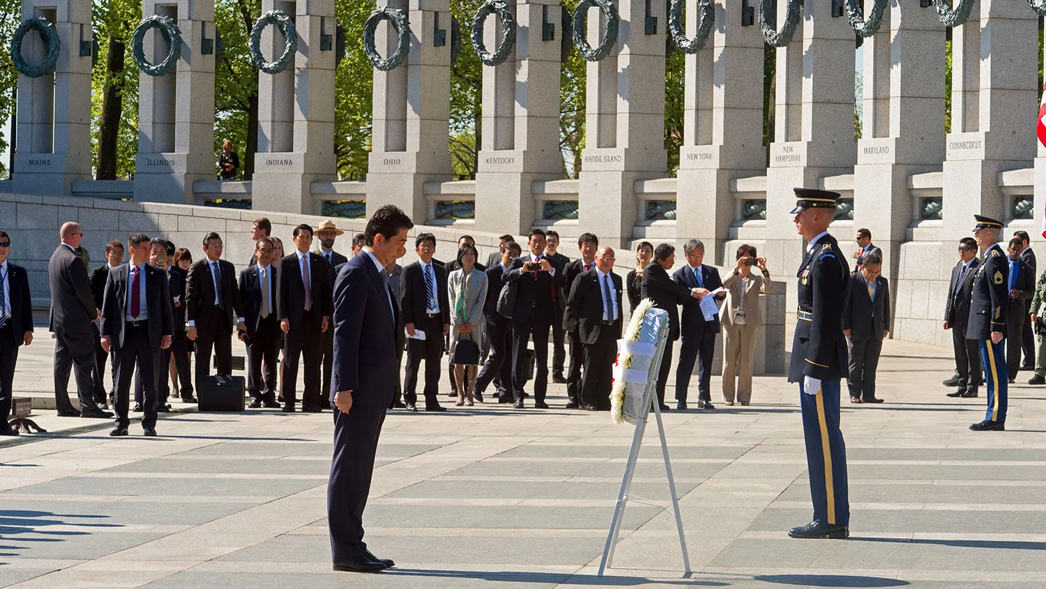 Japanese Prime Minister Shinzo Abe stands after placing a wreath at the National World War II Memorial April 29, 2015, in Washington, DC.
