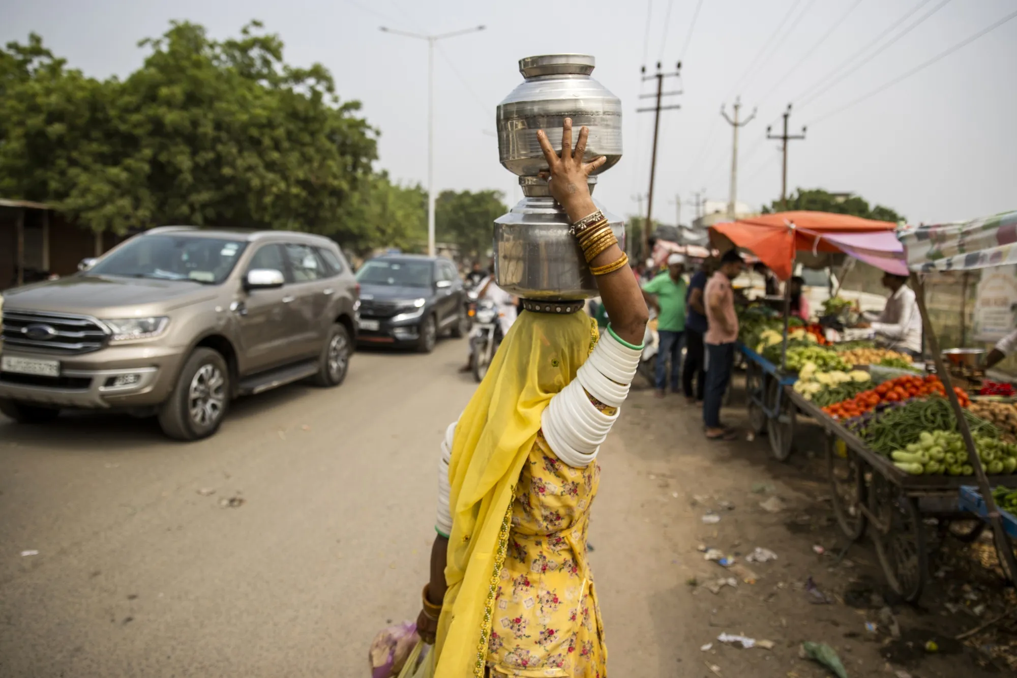 A customer shops at the Saturday Market in Kandla, India.