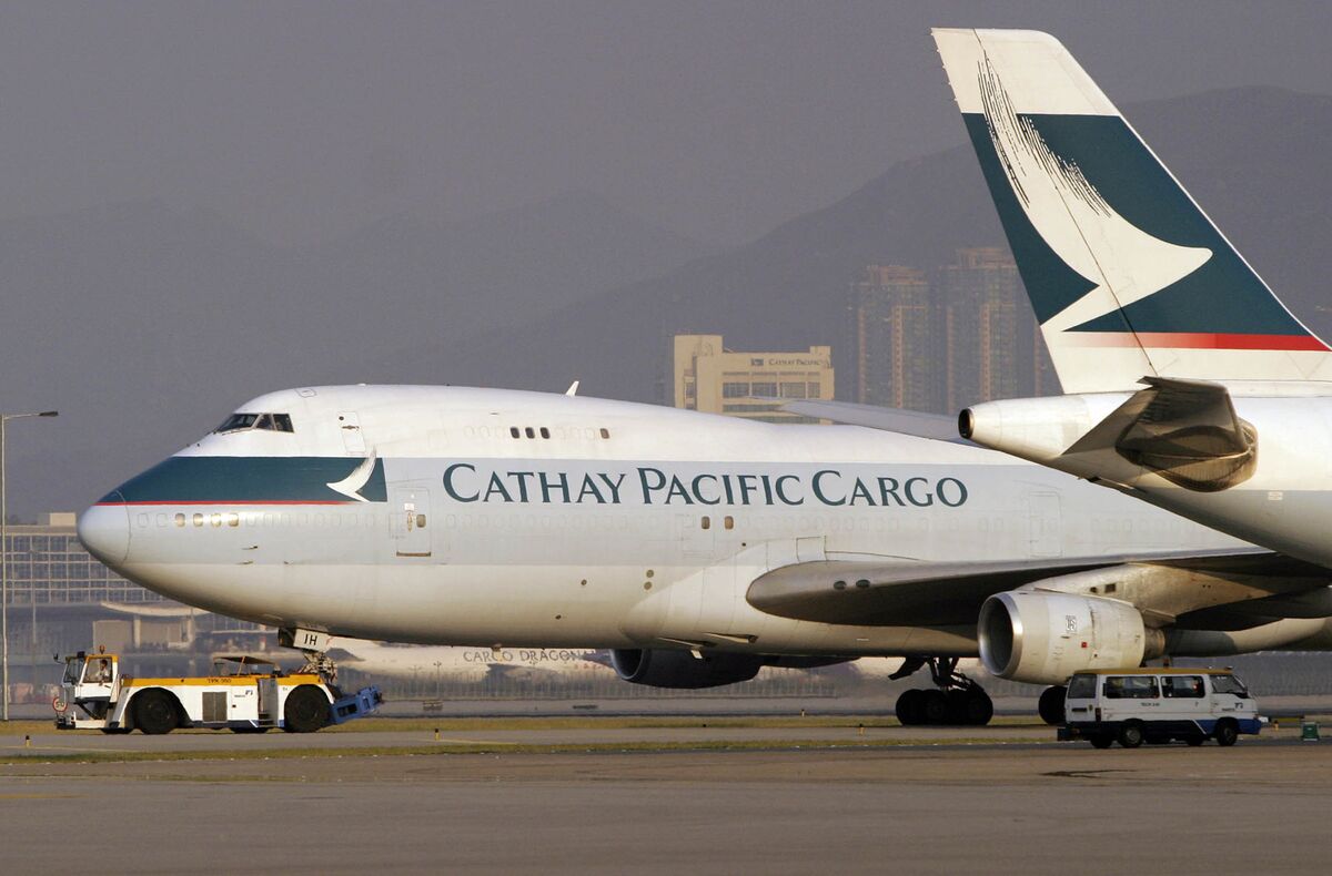 cathay pacific extra baggage international