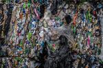 Crushed plastic bottles and containers bound in bales in Hong Kong, China.