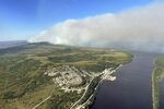 This aerial photo provided by the Bureau of Land Management Alaska Fire Service shows a tundra fire burning near the community of St. Mary's, Alaska, on June 10, 2022. Alaska's remarkable wildfire season includes over 530 blazes that have burned an area more than three times the size of Rhode Island, with nearly all the impacts, including dangerous breathing conditions from smoke, attributed to fires started by lightning. (Ryan McPherson/Bureau of Land Management Alaska Fire Service via AP, File)