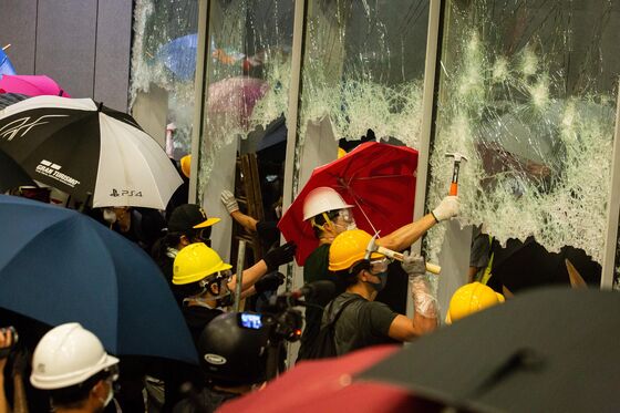 Hong Kong on Edge After Historic Night of Vandalism and Tear Gas