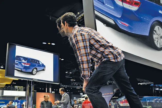 A Kinect app lets auto show attendees get inside Nissan's redesigned Pathfinder