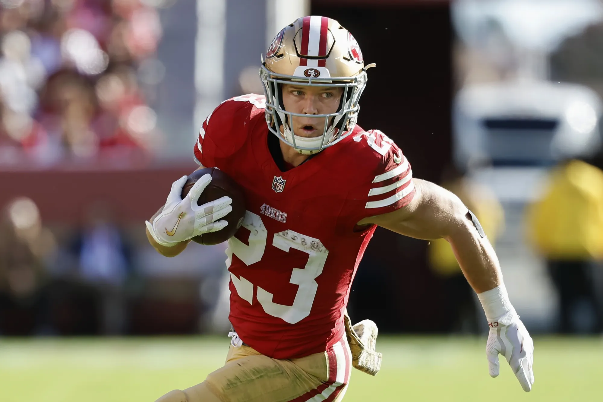San Francisco 49ers running back Christian McCaffrey (23) runs against the Tampa Bay Buccaneers during the first half of an NFL football game in Santa Clara, Calif., Sunday, Nov. 19, 2023. Christian McCaffrey is a finalist for The Associated Press 2023 NFL Most Valuable Player and Offensive Player of the Year awards. The winners will be announced at NFL Honors on Feb. 8. (AP Photo/Josie Lepe, File)