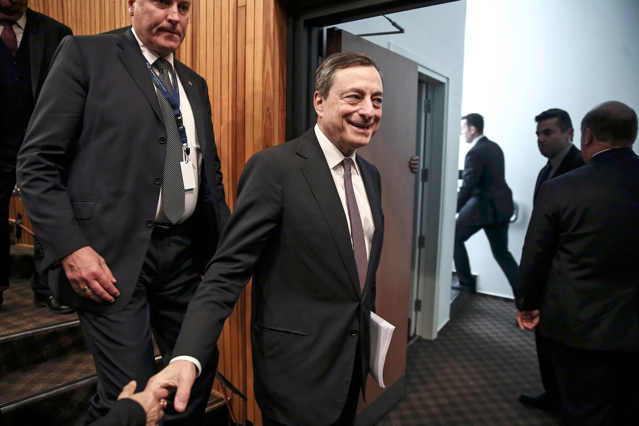 ECB President Mario Draghi leaves after attending a news conference in Nicosia, Cyprus, on March 5, 2015.
