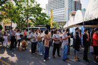 Voters lineup for early voting in Bangkok on May 7.
