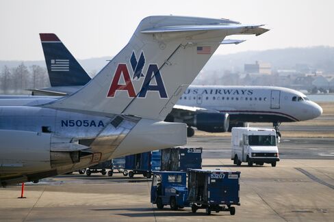 AMR, US Airways Leaders Defend Merger Called Bad for Fliers