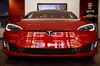 Tesla Takes Its Foot Off the Cash-Burn Pedal