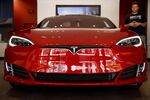 Tesla Takes Its Foot Off the Cash-Burn Pedal
