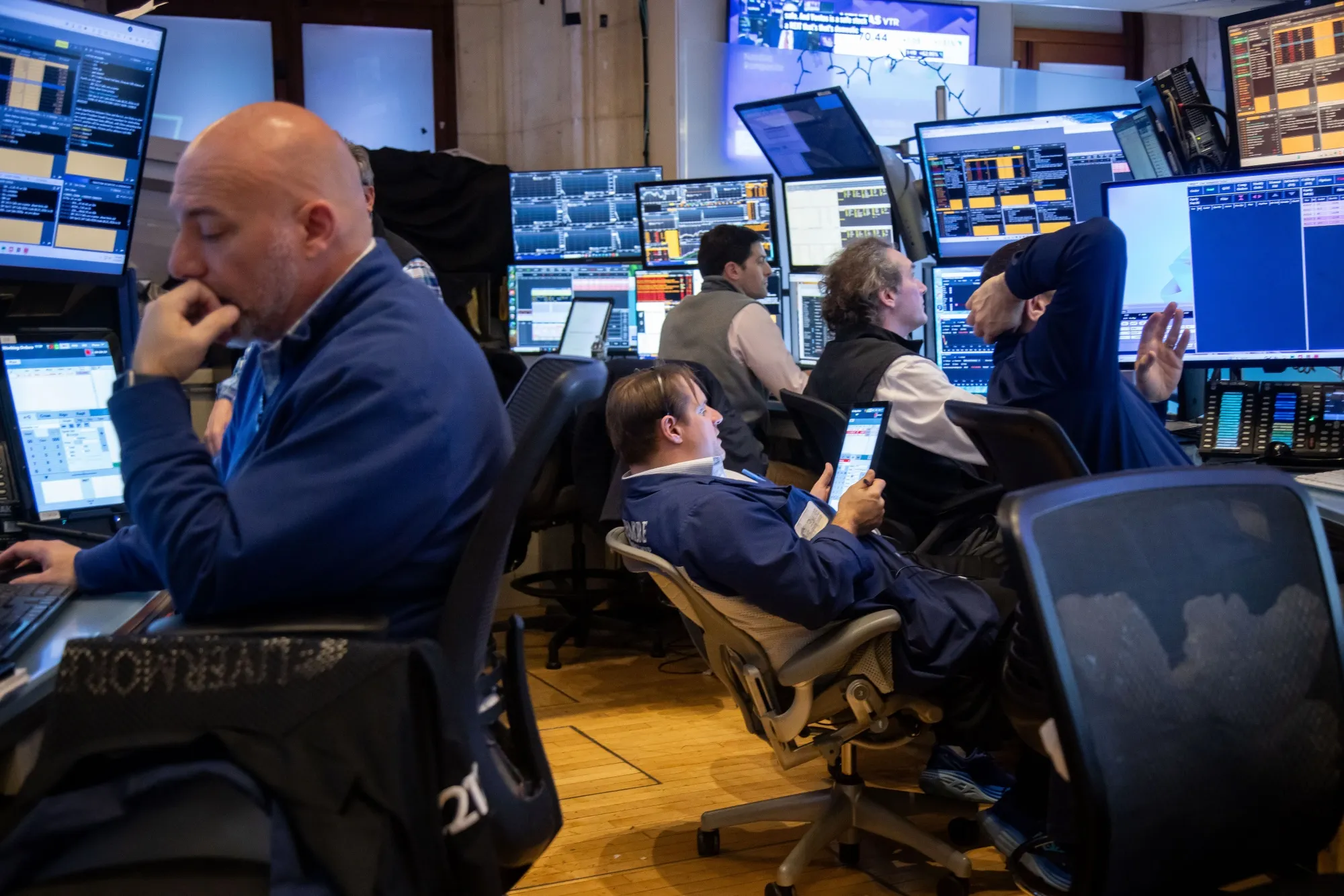Traders work on the floor of the New York Stock Exchange.
