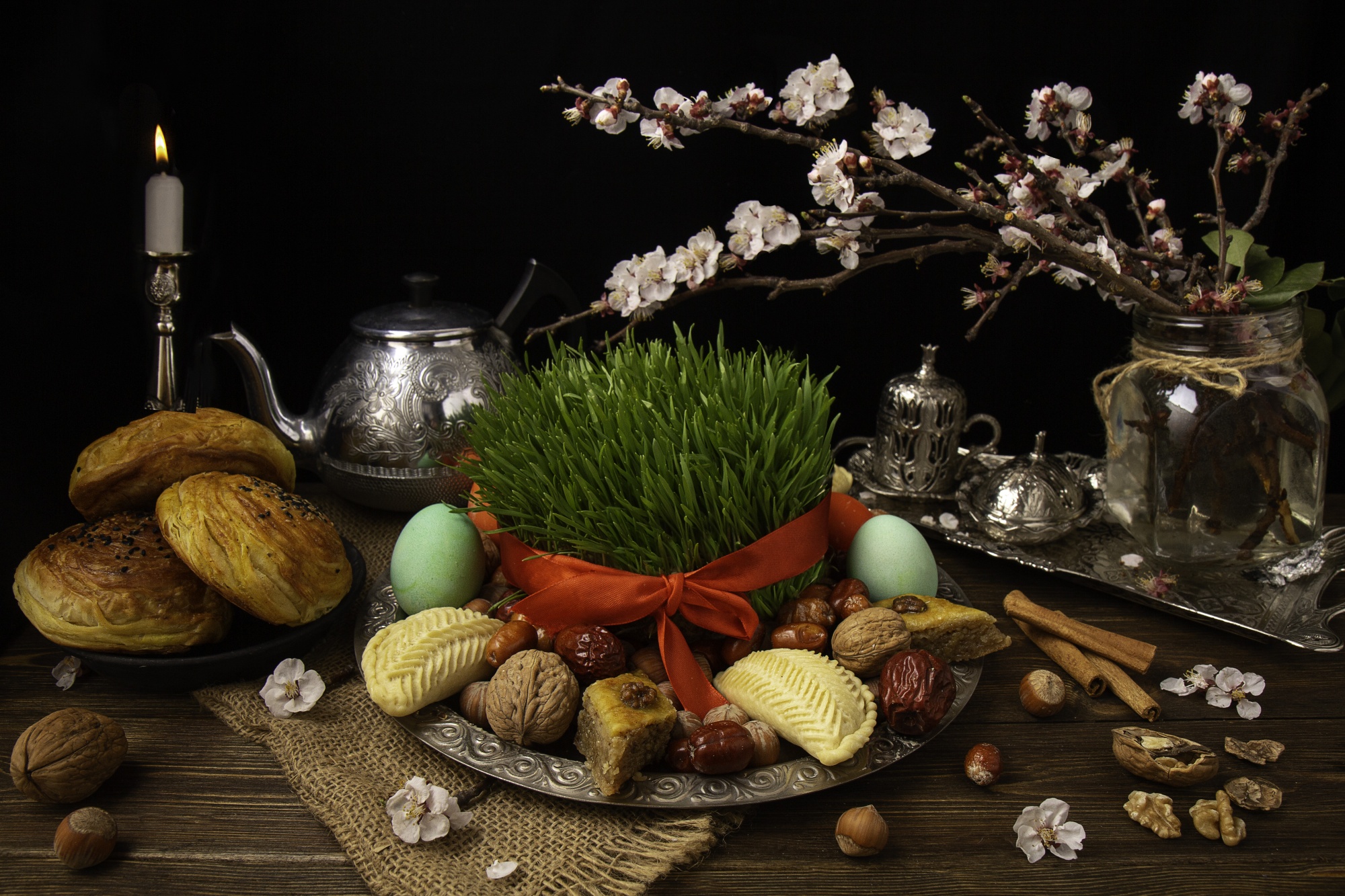 A table set with typical Nowruz items.