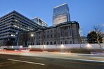Traffic travels past the Bank of Japan (BOJ) headquarters in Tokyo, Japan.
