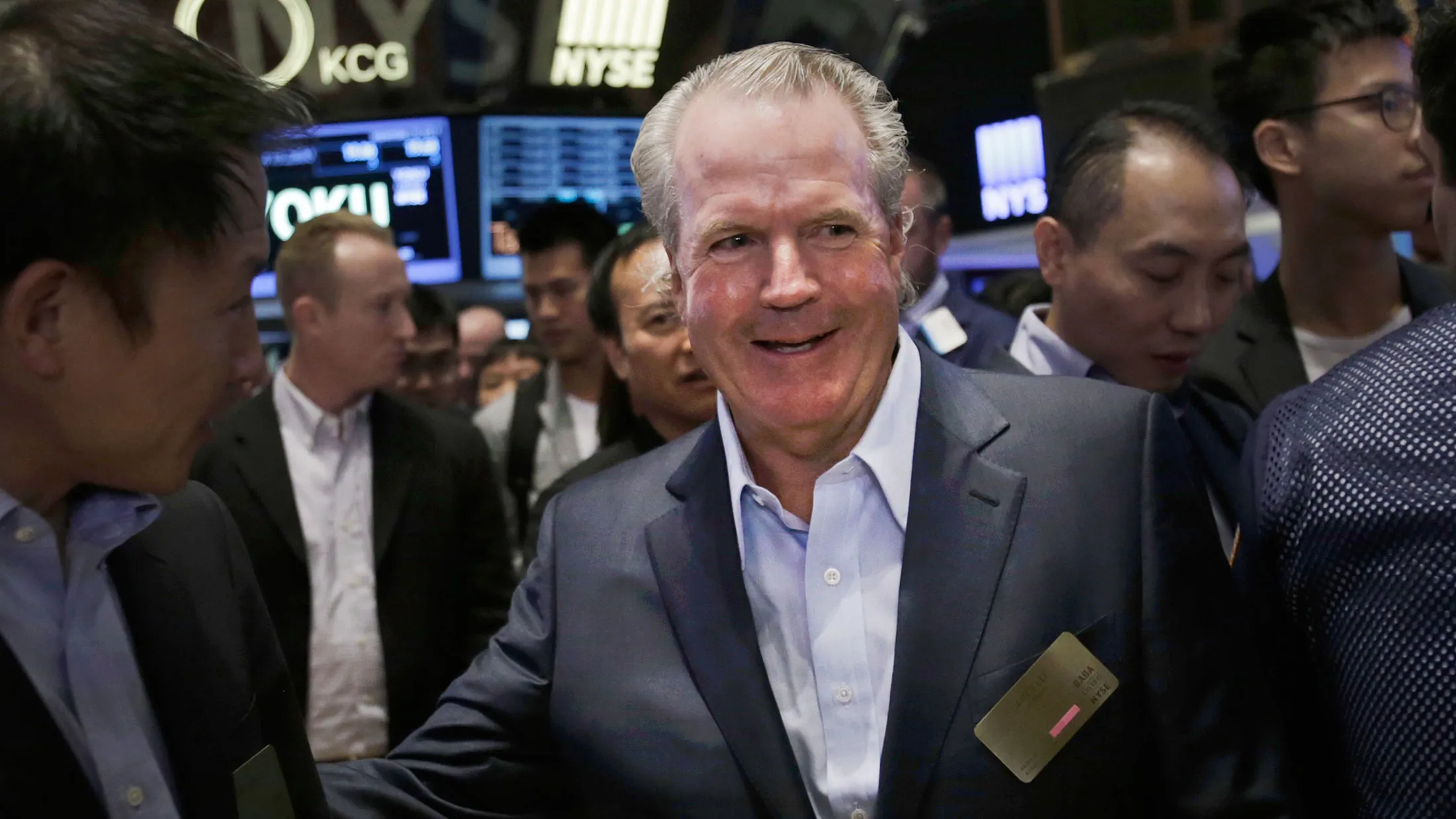 Jimmy Lee, right, at the New York Stock Exchange in Sept. 2014.
