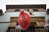 A flag bearing Huawei Technology's logo at the company’s new campus in Dongguan, China.