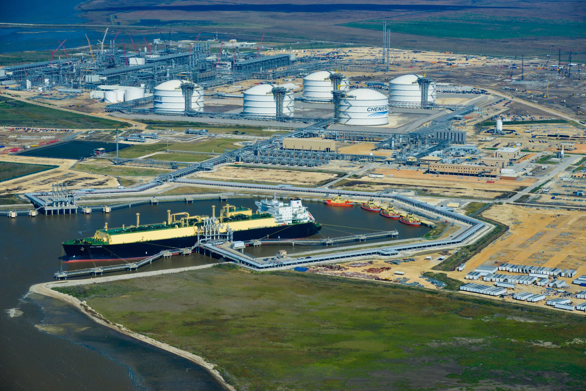An LNG carrier ship sits docked at the Cheniere Energy Inc. terminal in Sabine Pass, Texas.
