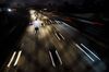 Vehicles drive in traffic down the 405 freeway at night in Inglewood, California, U.S., on Thursday, Sept. 19, 2019. The Trump administration moved to strip California of its authority to limit greenhouse gas emissions from vehicles, even as it warned the state it needs to do more to combat smog.