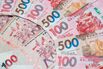 Hong Kong Dollar, Chinese Yuan and US Dollar Banknotes As Currency Peg Intervention From HKMA Continues Into Third Day