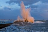 A wave crashes on a dyke in Lomener, western France, on Nov. 2.