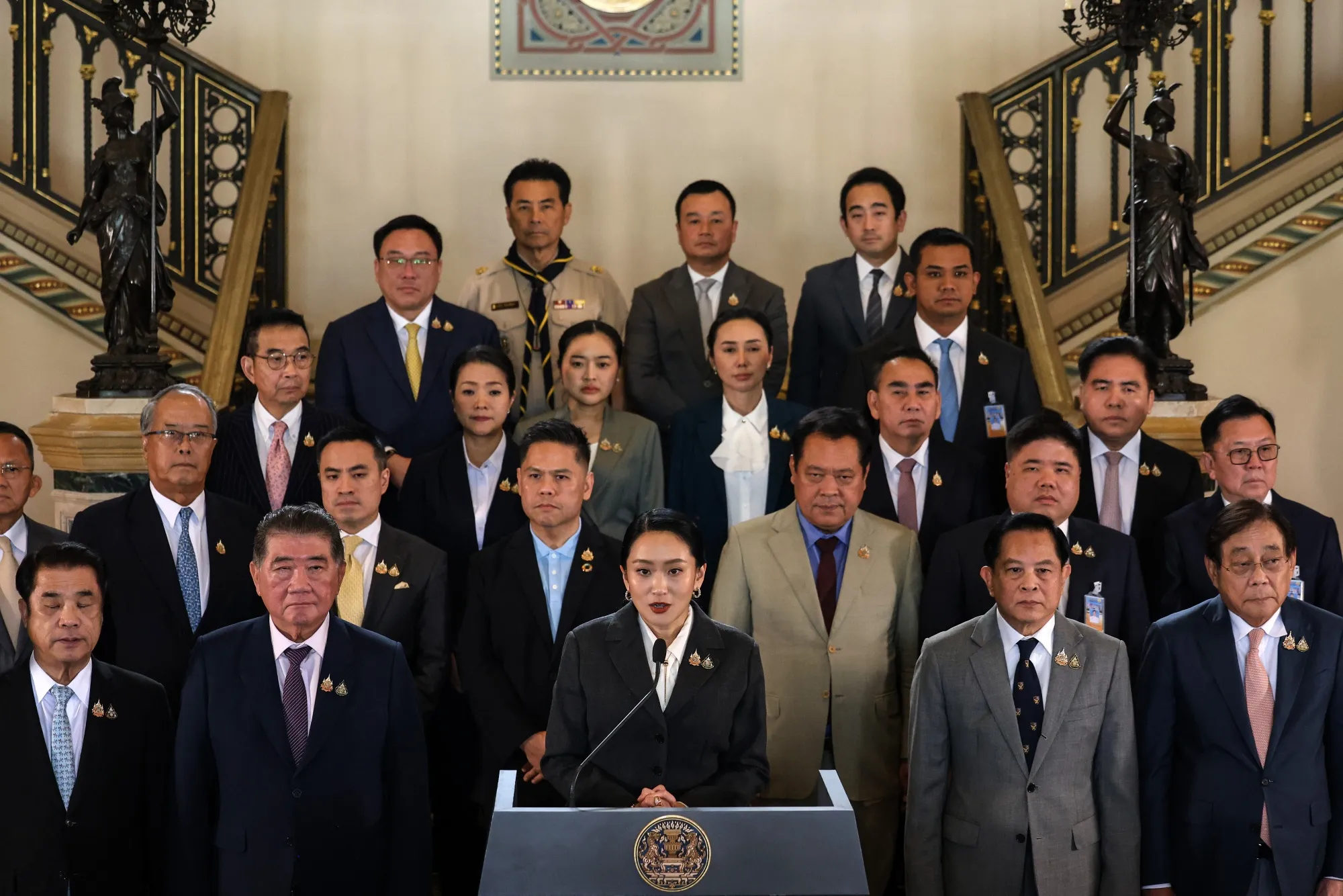 Former Thailand prime minister Paetongtarn Shinawatra speaks to members of the media following her dismissal by the Constitutional Court at the Government House in Bangkok on&nbsp;Aug. 29.
