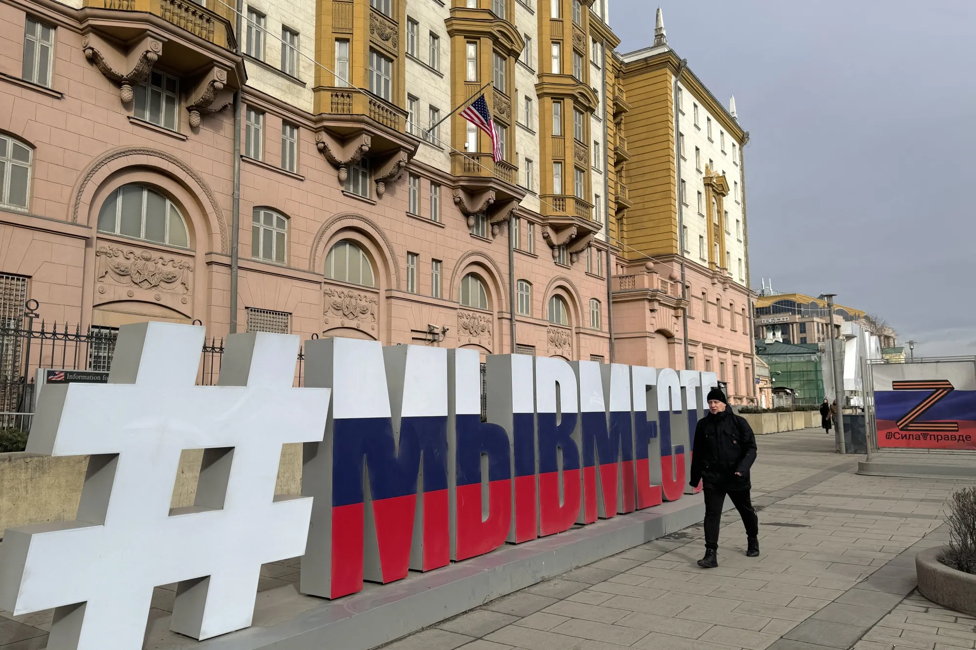 Letters reading "We are together" in the colours of the Russian flag displayed outside the US embassy in Moscow on March 19.