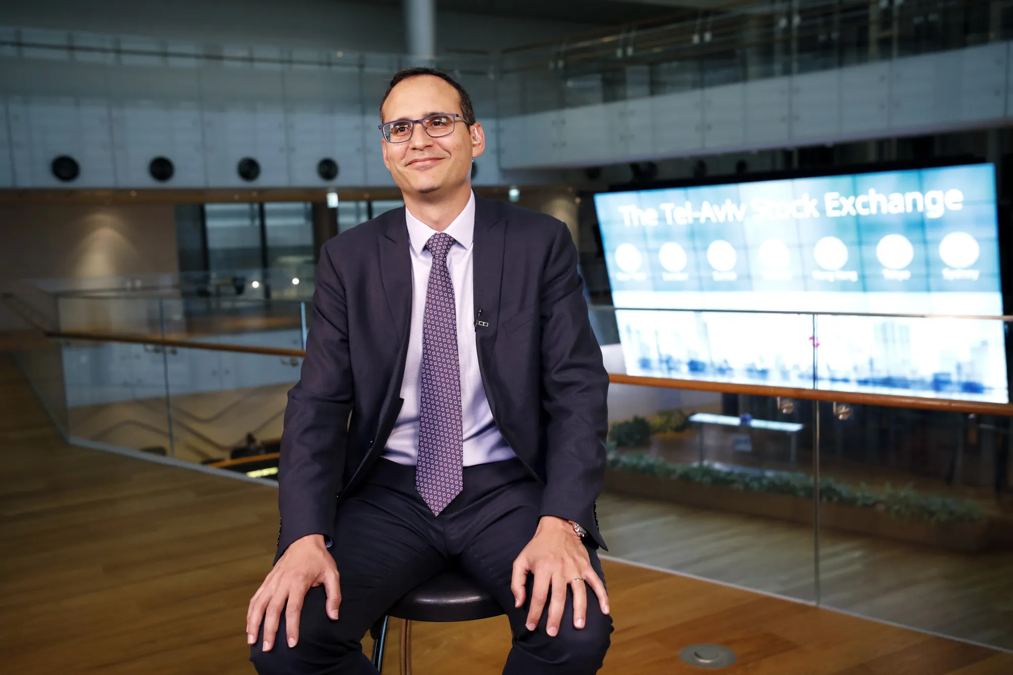 Ittai Ben-Zeev, chief executive officer of the Tel Aviv Stock Exchange (TASE), smiles during a Bloomberg Television interview in Tel Aviv.