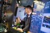 Traders work on the floor of the New York Stock Exchange (NYSE) in New York, U.S., on Tuesday, Sept. 4, 2018. U.S. stocks fell, Treasuries weakened and the dollar climbed as trade tensions persisted and emerging markets remained under pressure.