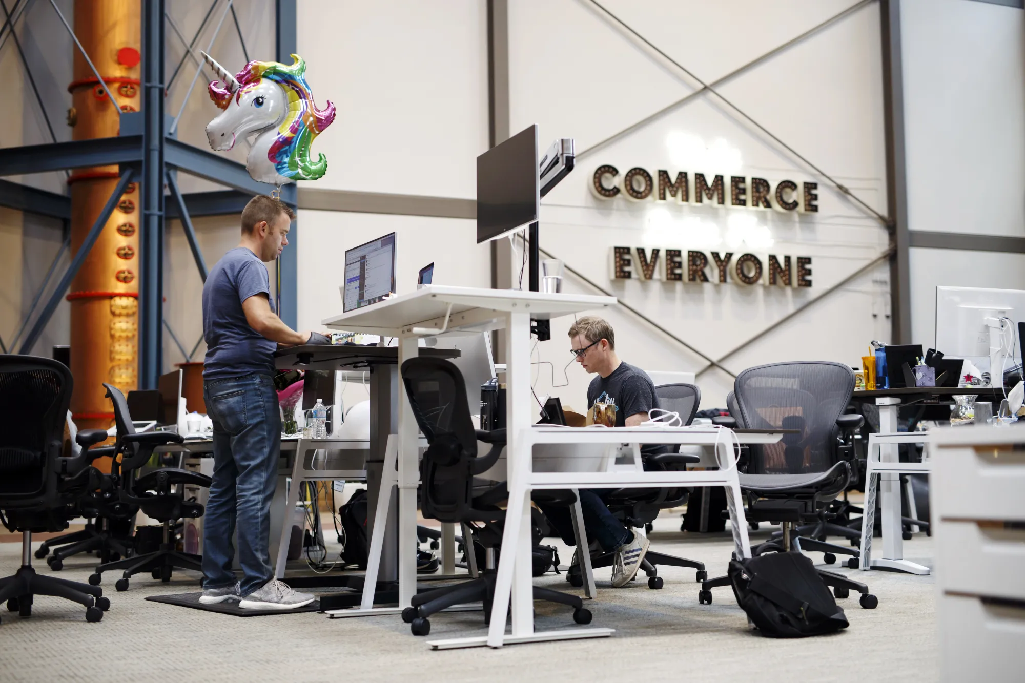 Employees work at the Shopify office in Waterloo, Ontario.