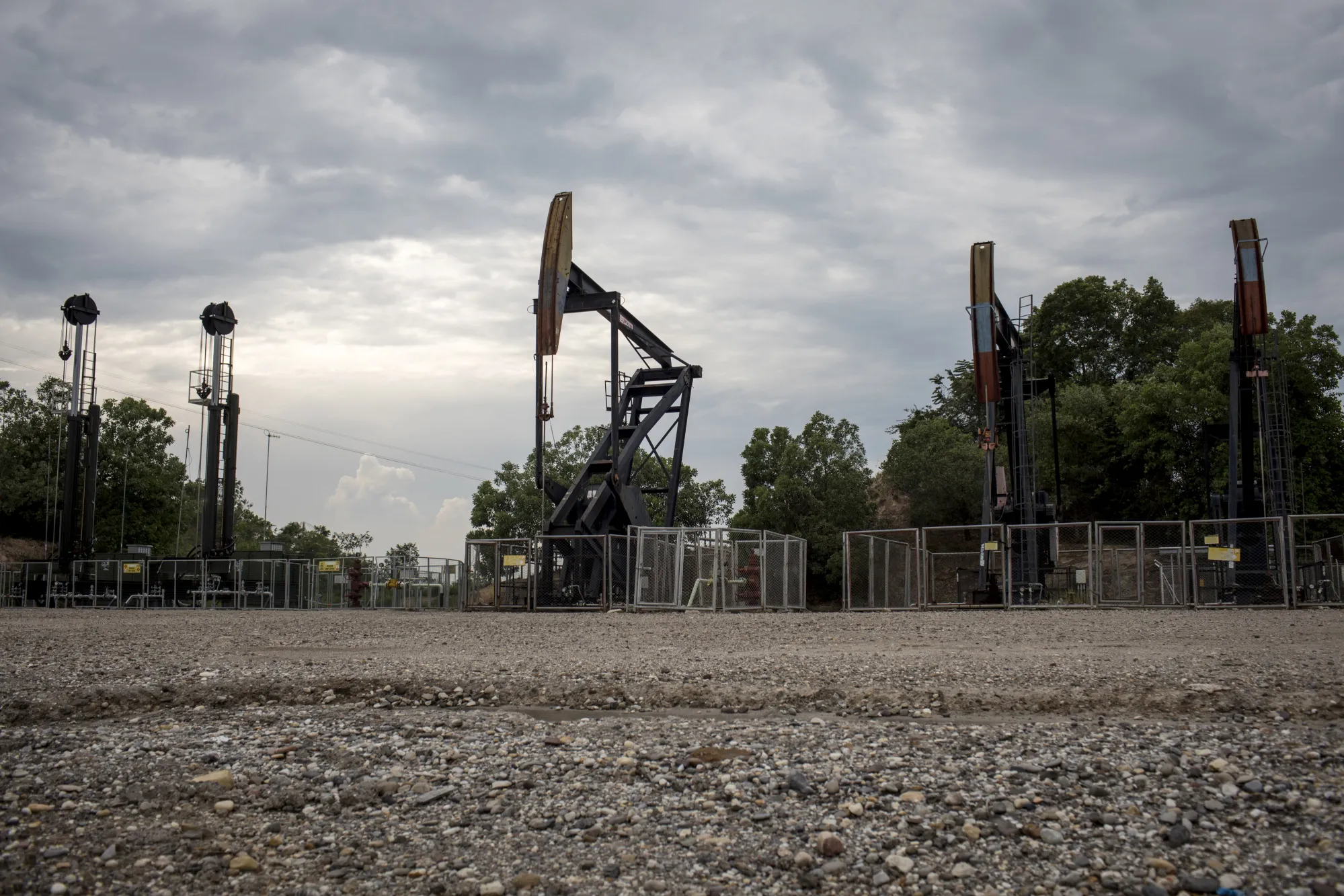 Pumpjacks operate near the Ecopetrol refinery in Barrancabermeja, Santander, Colombia.