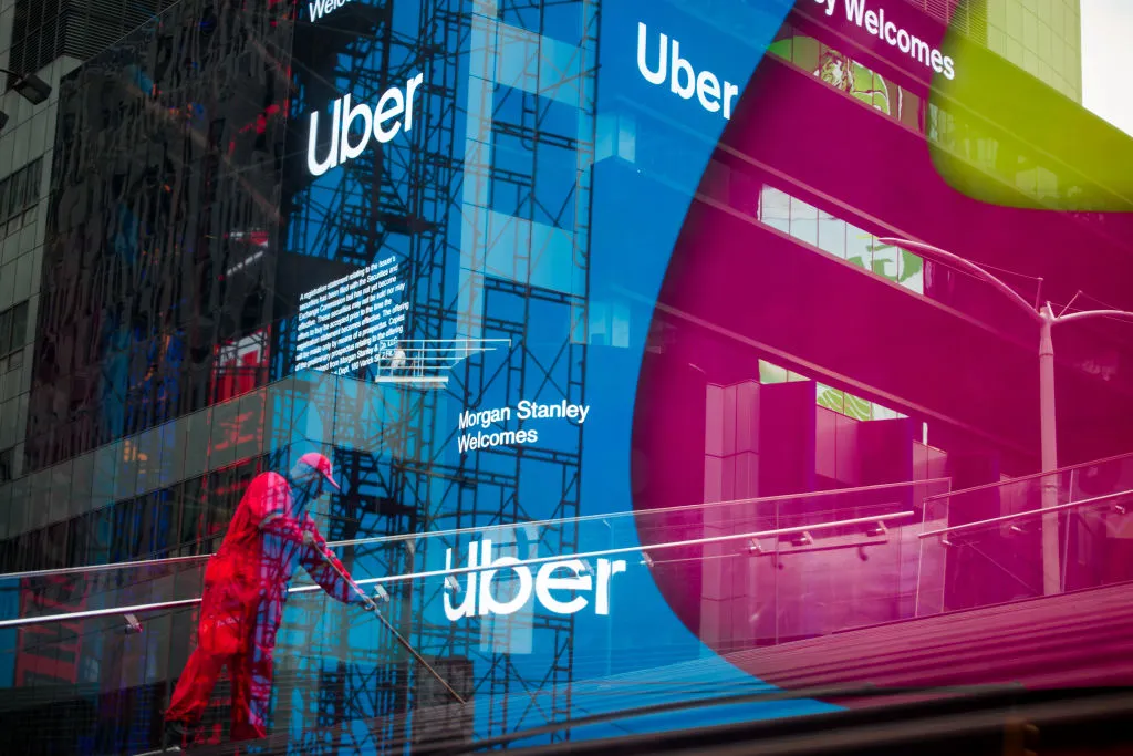 How does matching drivers with riders make it a logistics company?