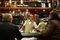 A waiter serves customers a cafe in Rome, Italy, on Tuesday, Dec. 6, 2016. Market reaction to Italian Prime Minister Matteo Renzi's defeat has been muted, with the euro rebounding after an initial sell off and 10-year yields holding below 2 percent. Photographer: Chris Ratcliffe/Bloomberg