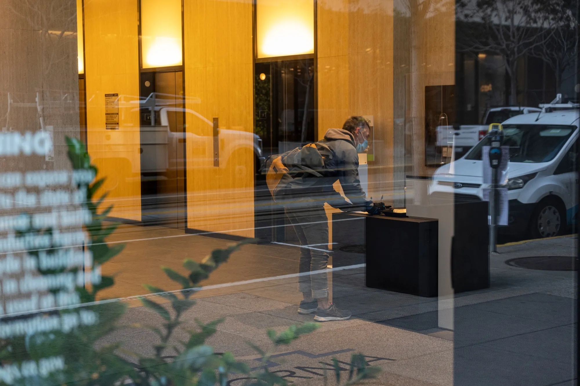 A worker signs in at an office building in San Francisco, California.
