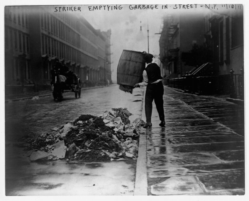 Striker Emptying Garbage in Street