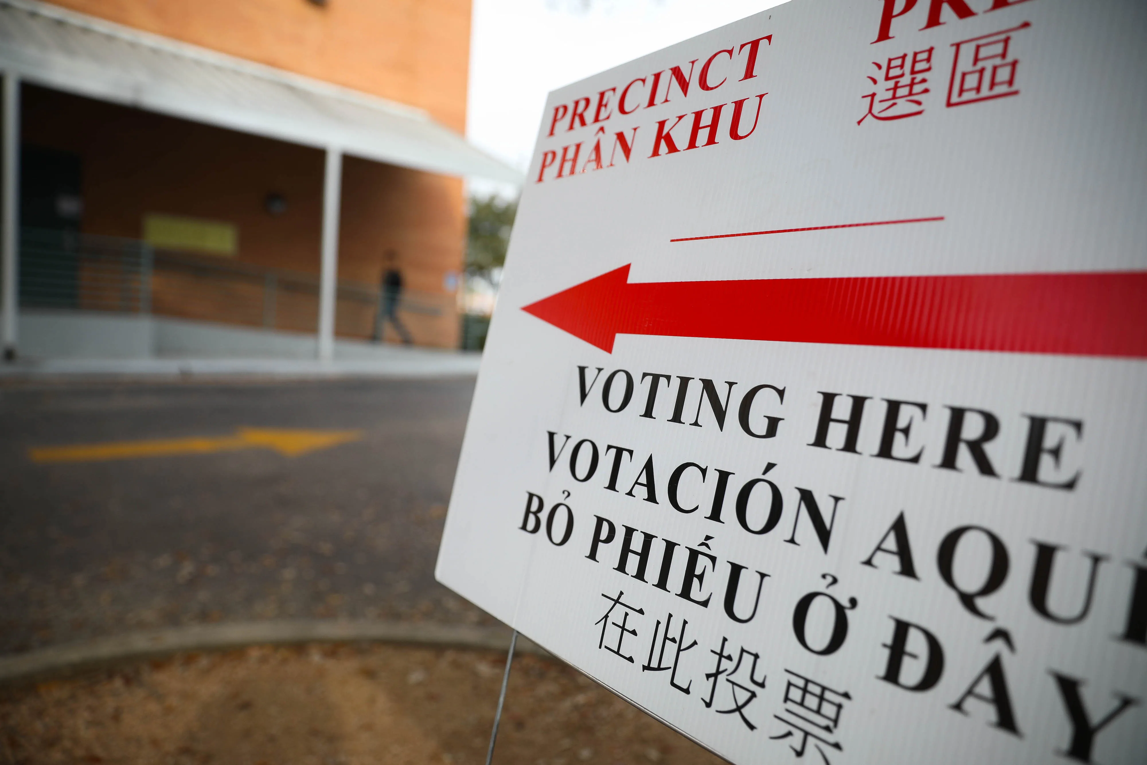 A "Voting Here" sign is displayed outside of the Trinity Lutheran Church Downtown polling station in Houston, Texas, U.S., on Tuesday, March 3, 2020.&nbsp;