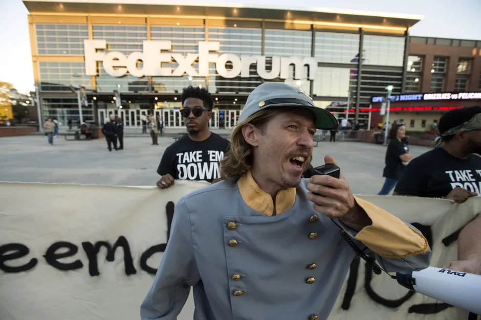 A demonstrator dressed as Confederate Gen. Nathan Bedford Forrest speaks with fellow protesters, Oct. 13, 2017. The Tennessee Historical Commission denied a request from the city of Memphis to remove a statue of Forrest from a city park.