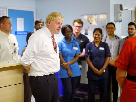 Boris Johnson Puts Focus on Nurses After Turning Back on Davos