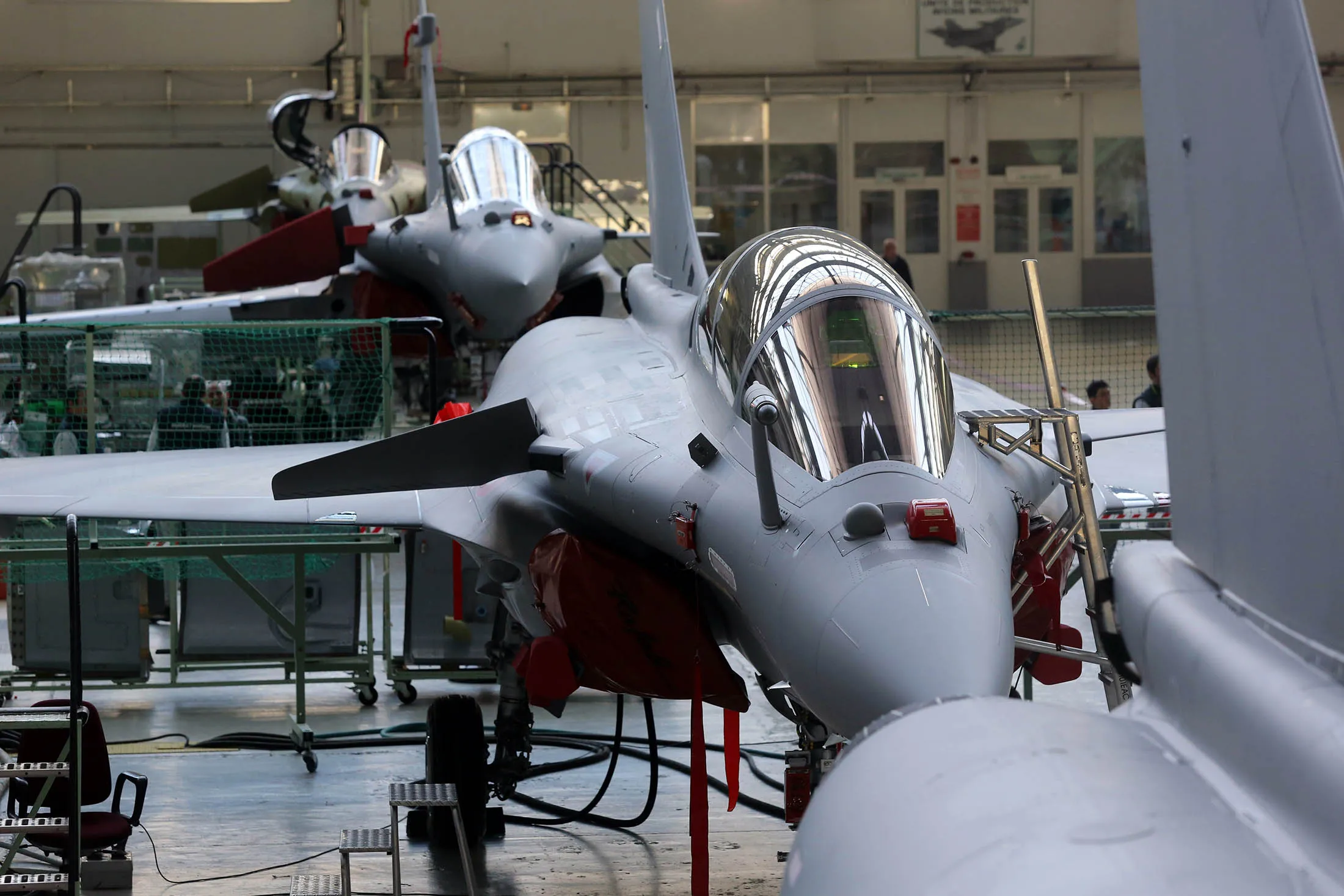 A picture shows the assembly line of the 'Rafale' jet fighter in the factory of French aircraft manufacturer Dassault Aviation on January 10, 2014 in Merignac, near Bordeaux, southwestern France. French Defence Minister Jean-Yves Le Drian made official on January 10 an estimated 1 billion euro contract between France and Dassault Aviation to further develop the fighter aircraft 'Rafale'. AFP PHOTO/ NICOLAS TUCAT (Photo credit should read NICOLAS TUCAT/AFP/Getty Images)

