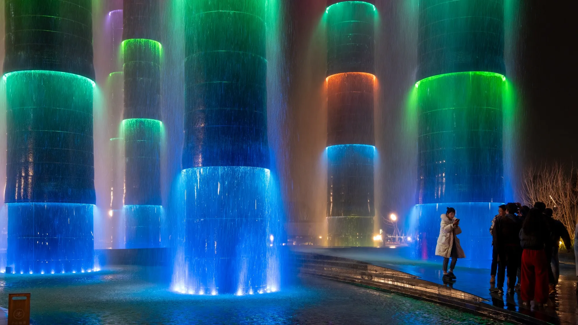 The illuminated “Tower of Vitality” water column at the Chengdu SKP in Sichuan Province.