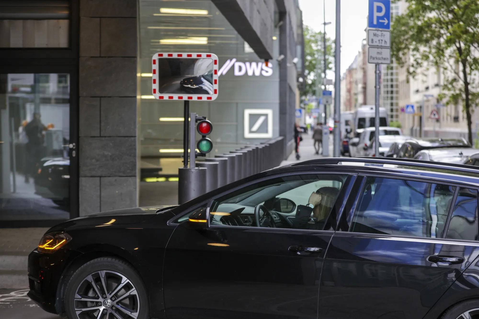 A police vehicle arrives at the DWS Group headquarters during a police raid in Frankfurt, Germany, on May 31.