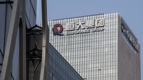 Evergrande Staves Off Default With Last-Minute Bond Payment
