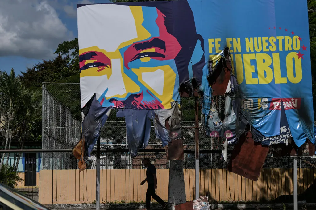 A billboard with the image of Maduro, which was vandalized during protests against the election result,&nbsp;in Valencia, Venezuela.