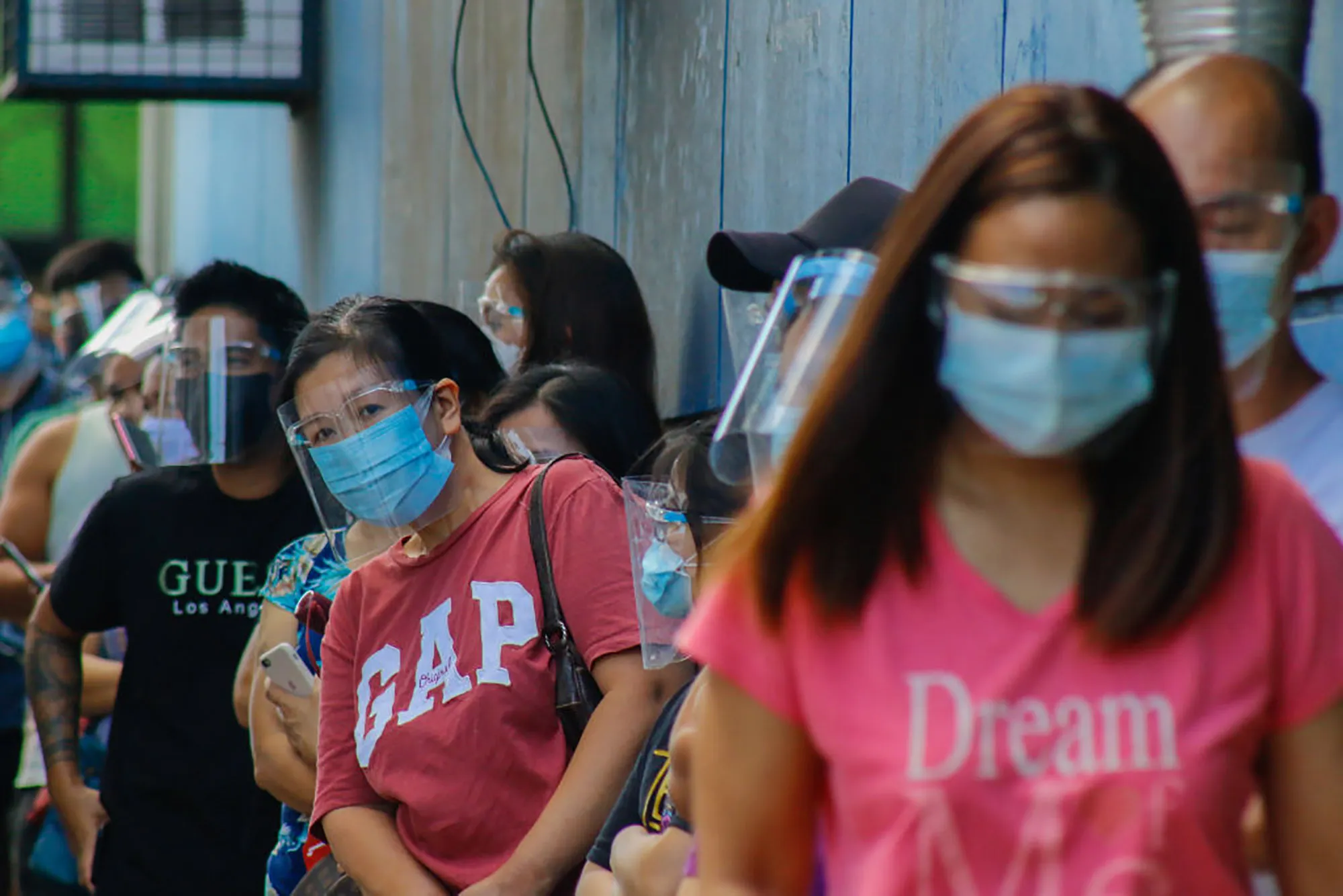 Lines of customers outside the grocery store in Antipolo City before the reimposition of Enhanced Community Quarantine.&nbsp;