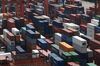Shipping containers stacked at Kwai Tsing Container Terminal, operated by Hong Kong International Terminals Ltd. (HIT), a unit of CK Hutchison Holdings Ltd., are seen from the Mitsui O.S.K. Lines Ltd. (MOL) Triumph container ship docked at the terminal in Hong Kong, China, on Saturday, April 15, 2017. The MOL Triumph is the world's largest in service container ship.