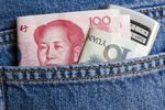 Yuan Bills & Mobile Phone In Back Pocket
